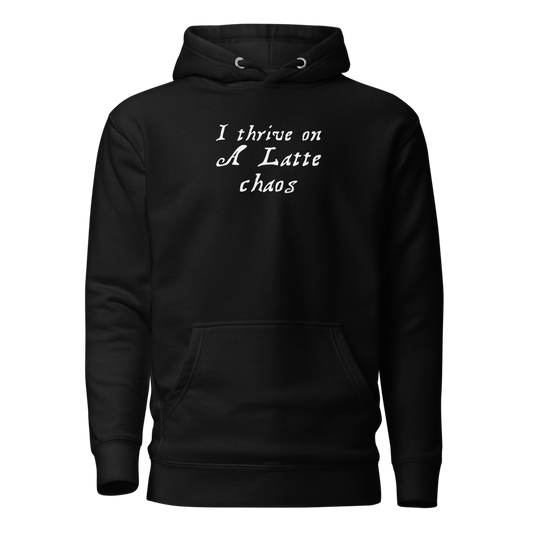 "I thrive on a latte chaos" printed on a black on an invisible / simulated body