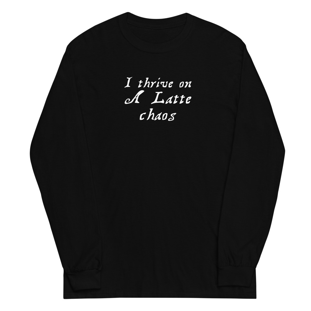 "I thrive on a latte chaos" printed on a black men's long sleeve shirt laying on a flat surface
