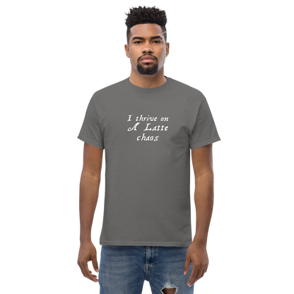 "I thrive on a latte chaos" printed on a charcoal unisex classic tee worn by a male