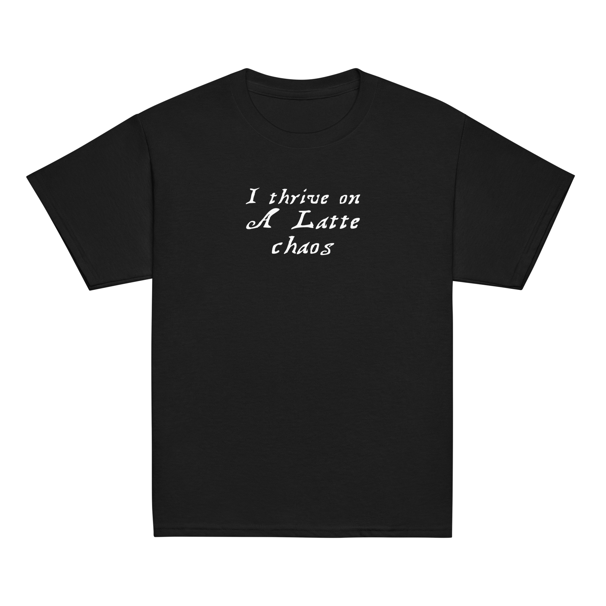 "I thrive on a latte chaos" printed on a black youth classic tee laying on a flat surface