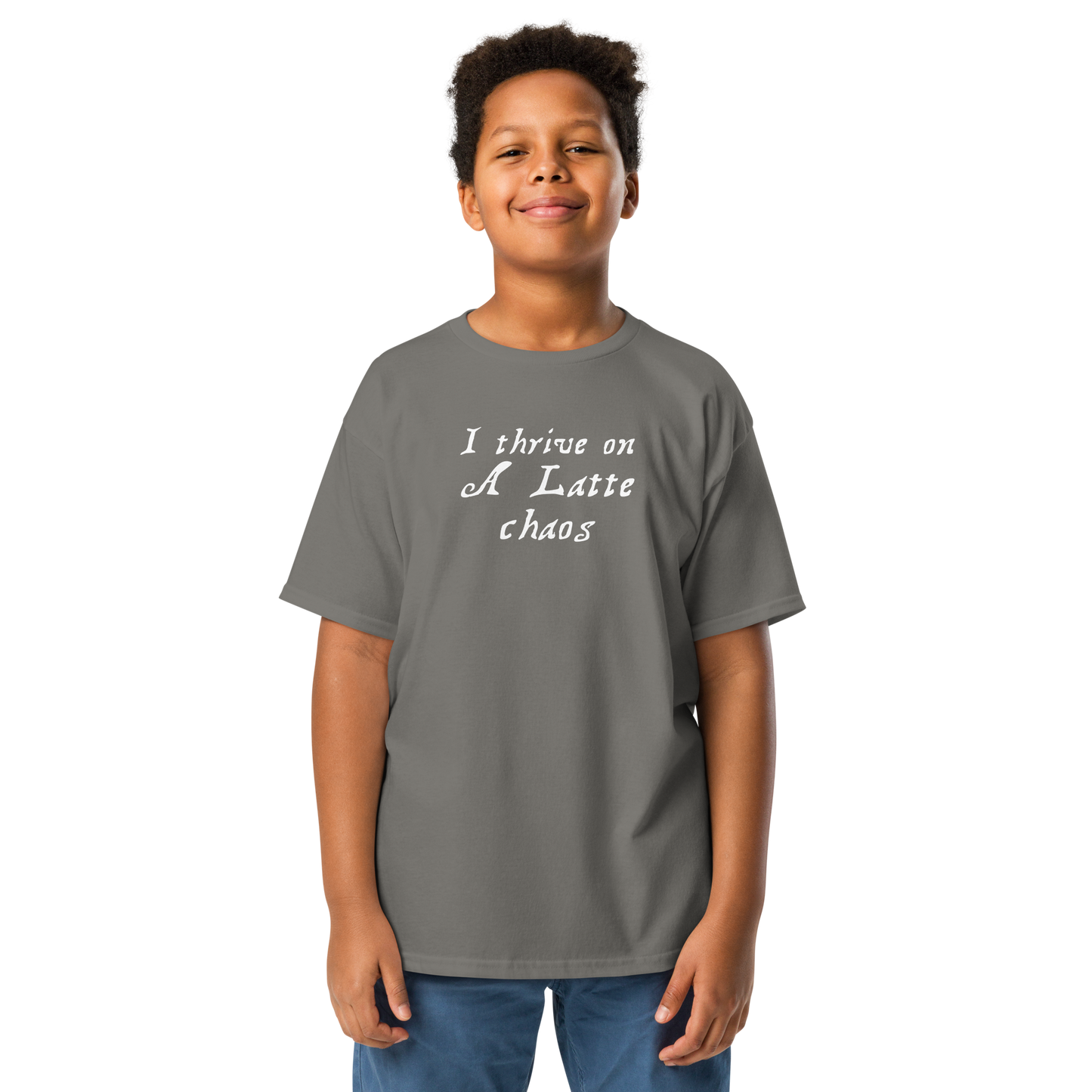 "I thrive on a latte chaos" printed on a charcoal youth classic tee worn by a male