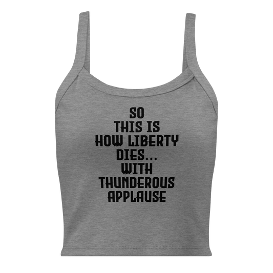 "So this is how liberty dies… with thunderous applause" printed on a athletic heather women's micro-rib tanktop laying on a flat surface
