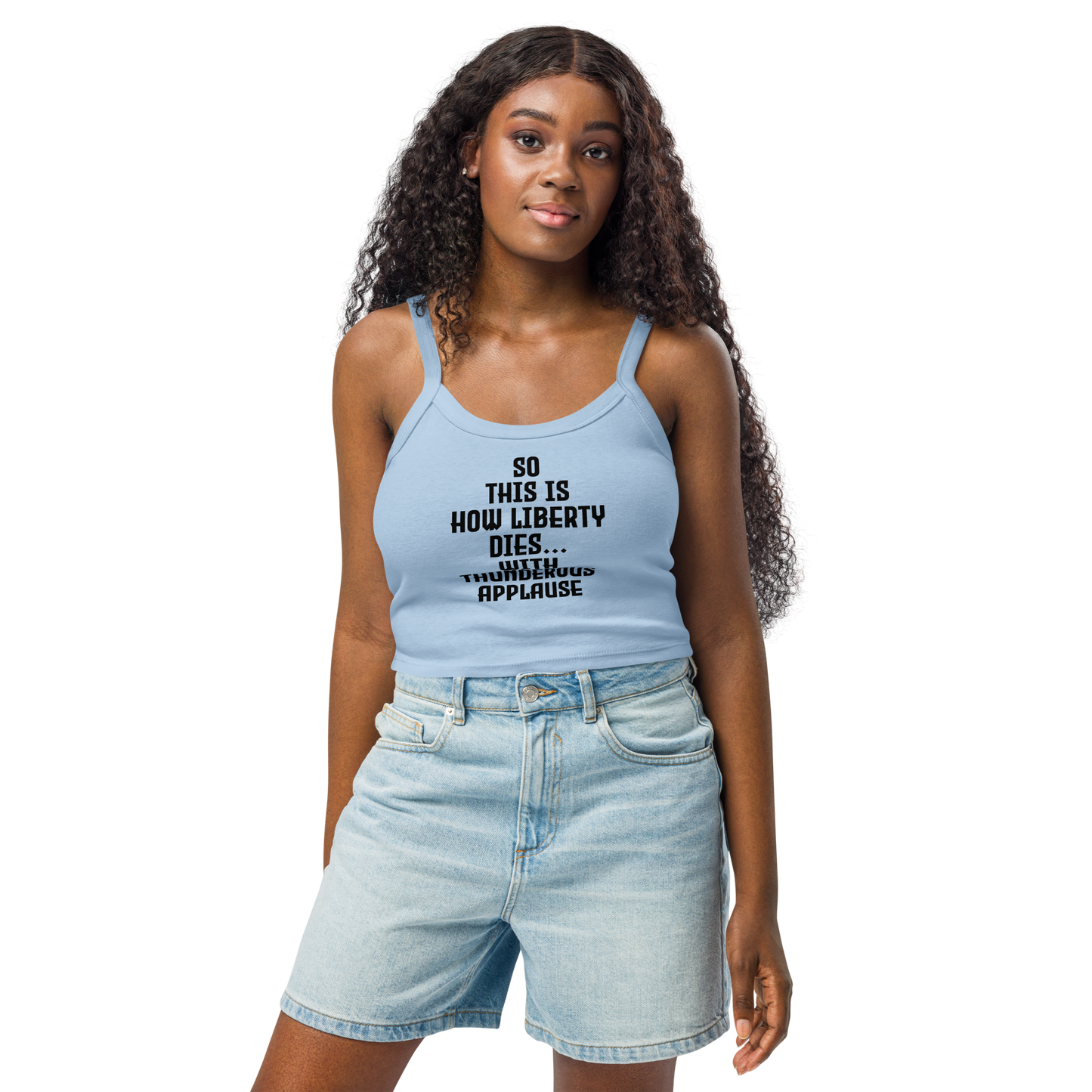 "So this is how liberty dies… with thunderous applause" printed on a solid baby blue blend women's micro-rib tanktop worn by a female