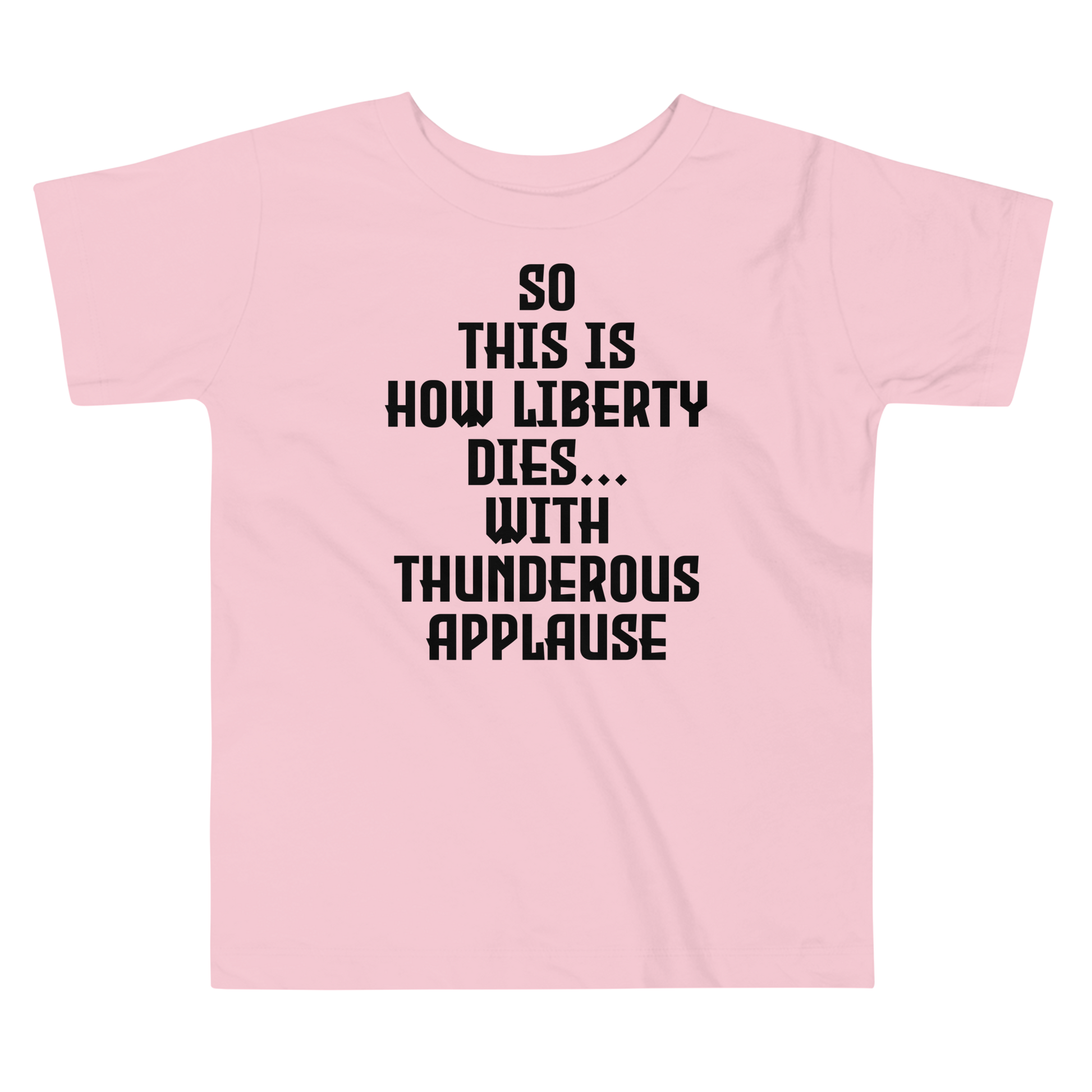 "So this is how liberty dies… with thunderous applause" printed on a pink toddler short sleeve tee laying on a flat surface