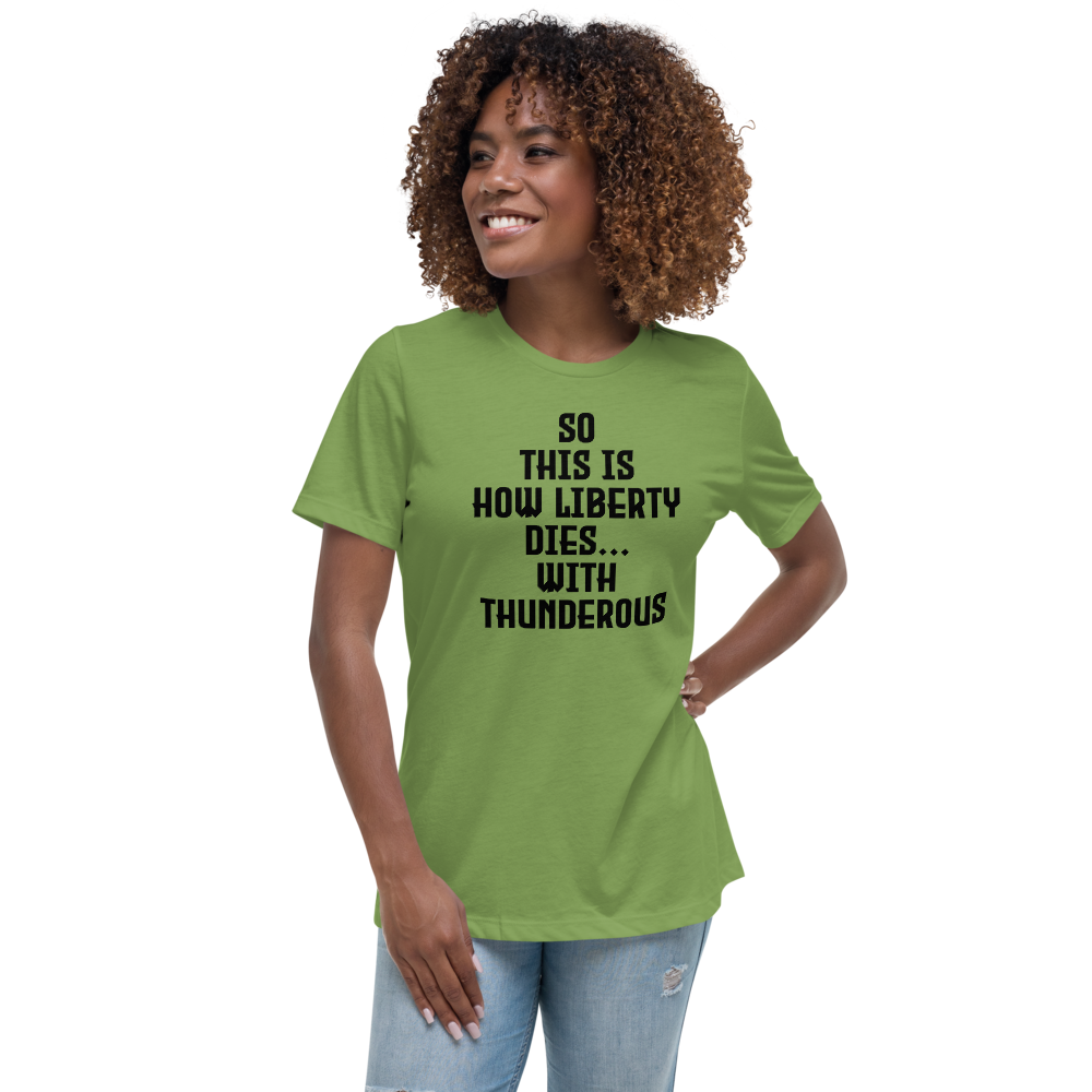 "So this is how liberty dies… with thunderous applause" printed on a leaf women's relaxed t-shirt worn by a female