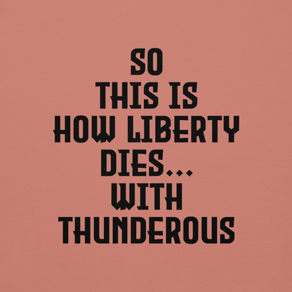 "So this is how liberty dies… with thunderous applause" printed on a dusty rose background