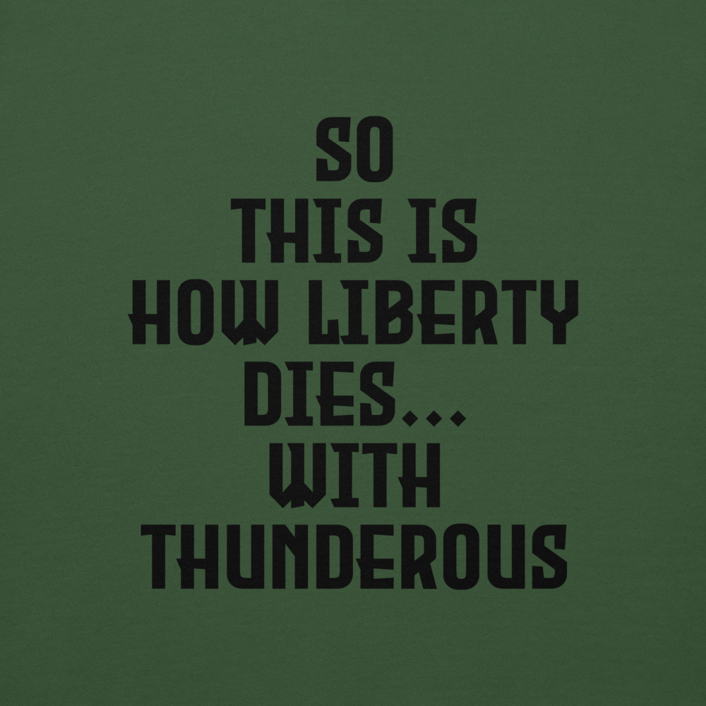 "So this is how liberty dies… with thunderous applause" printed on a forest green background