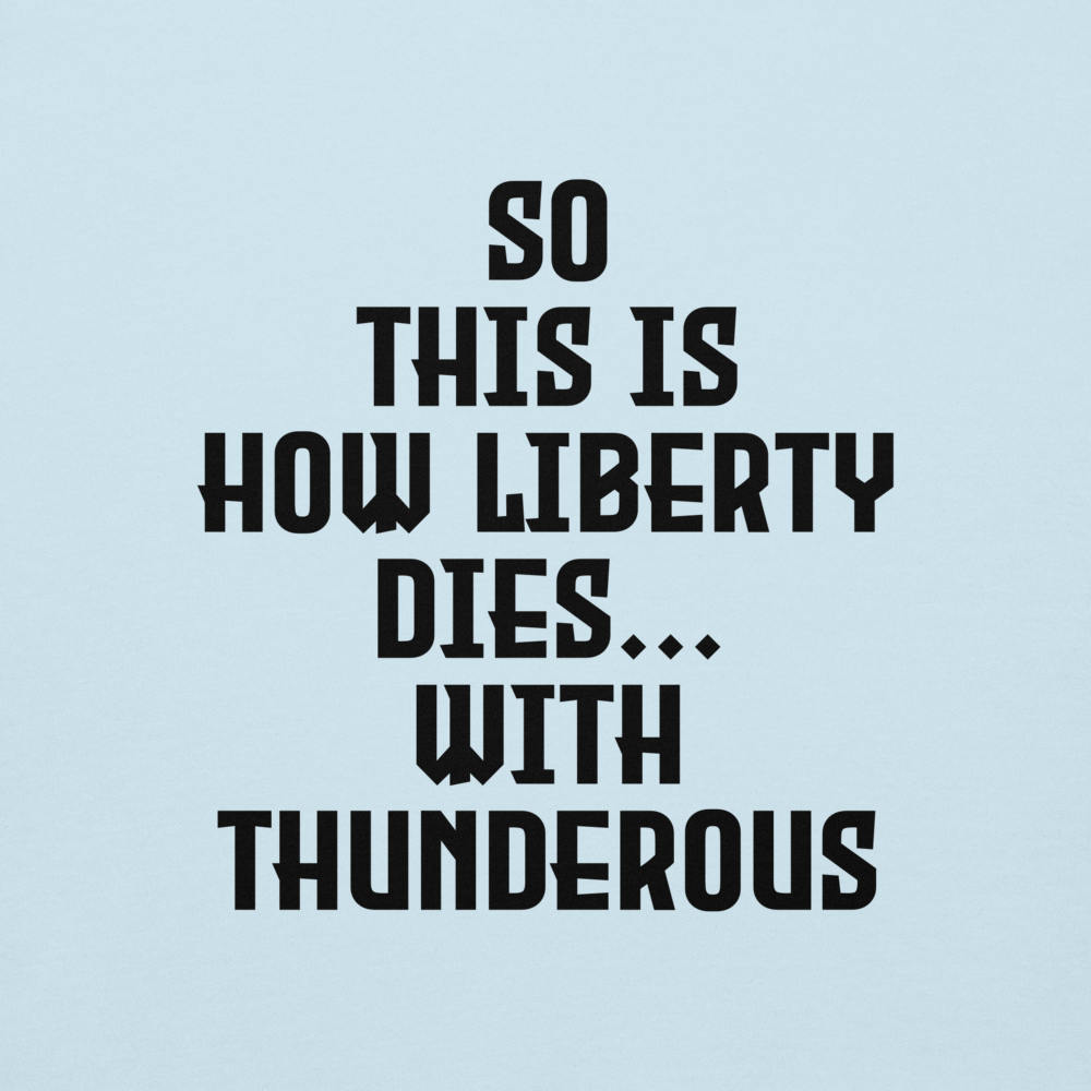 "So this is how liberty dies… with thunderous applause" printed on a sky blue background
