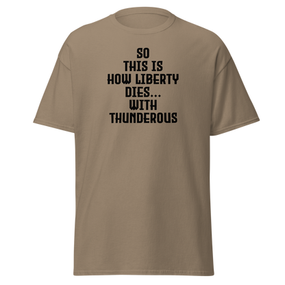 "So this is how liberty dies… with thunderous applause" printed on a brown savana on an invisible body