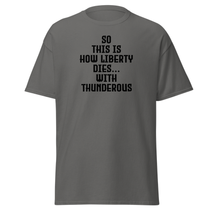 "So this is how liberty dies… with thunderous applause" printed on a charcoal on an invisible body