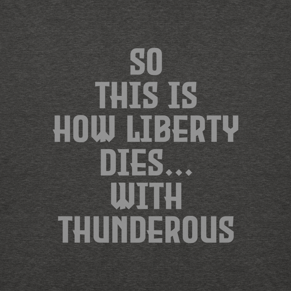 "So this is how liberty dies… with thunderous applause" printed on a charcoal heather background