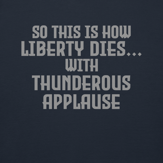 "So this is how liberty dies… with thunderous applause" printed on a navy blazer background