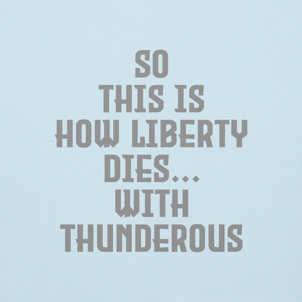"So this is how liberty dies… with thunderous applause" printed on a sky blue background