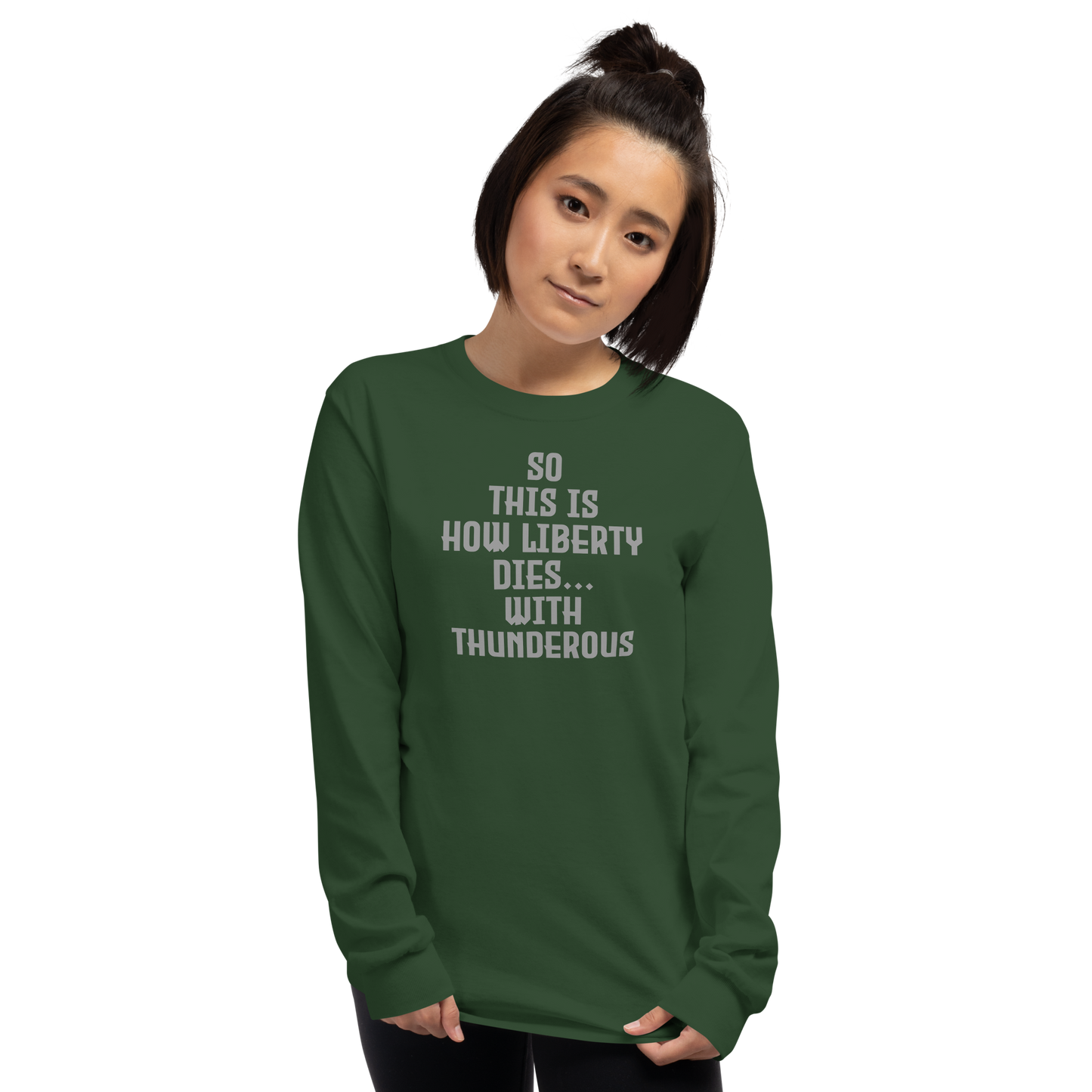 "So this is how liberty dies… with thunderous applause" printed on a forest green men's long sleeve shirt worn by a female