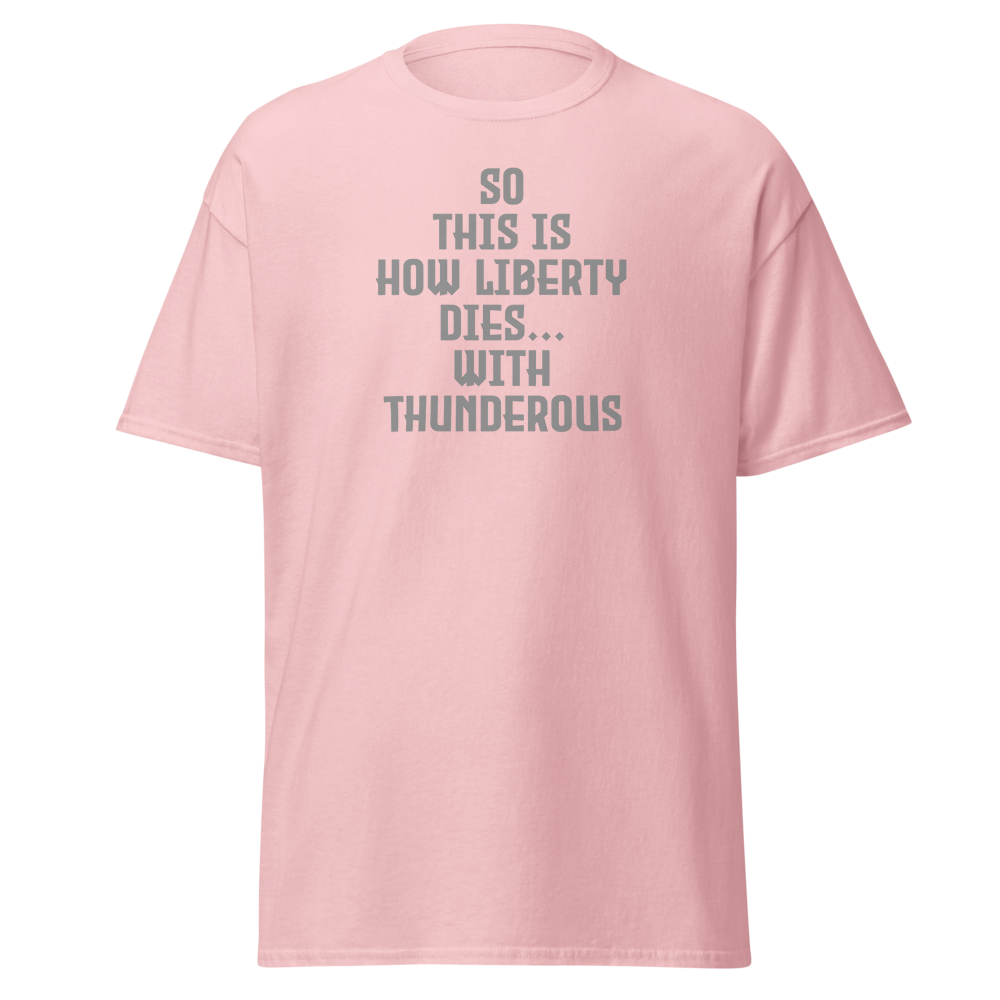 "So this is how liberty dies… with thunderous applause" printed on a light pink on an invisible body
