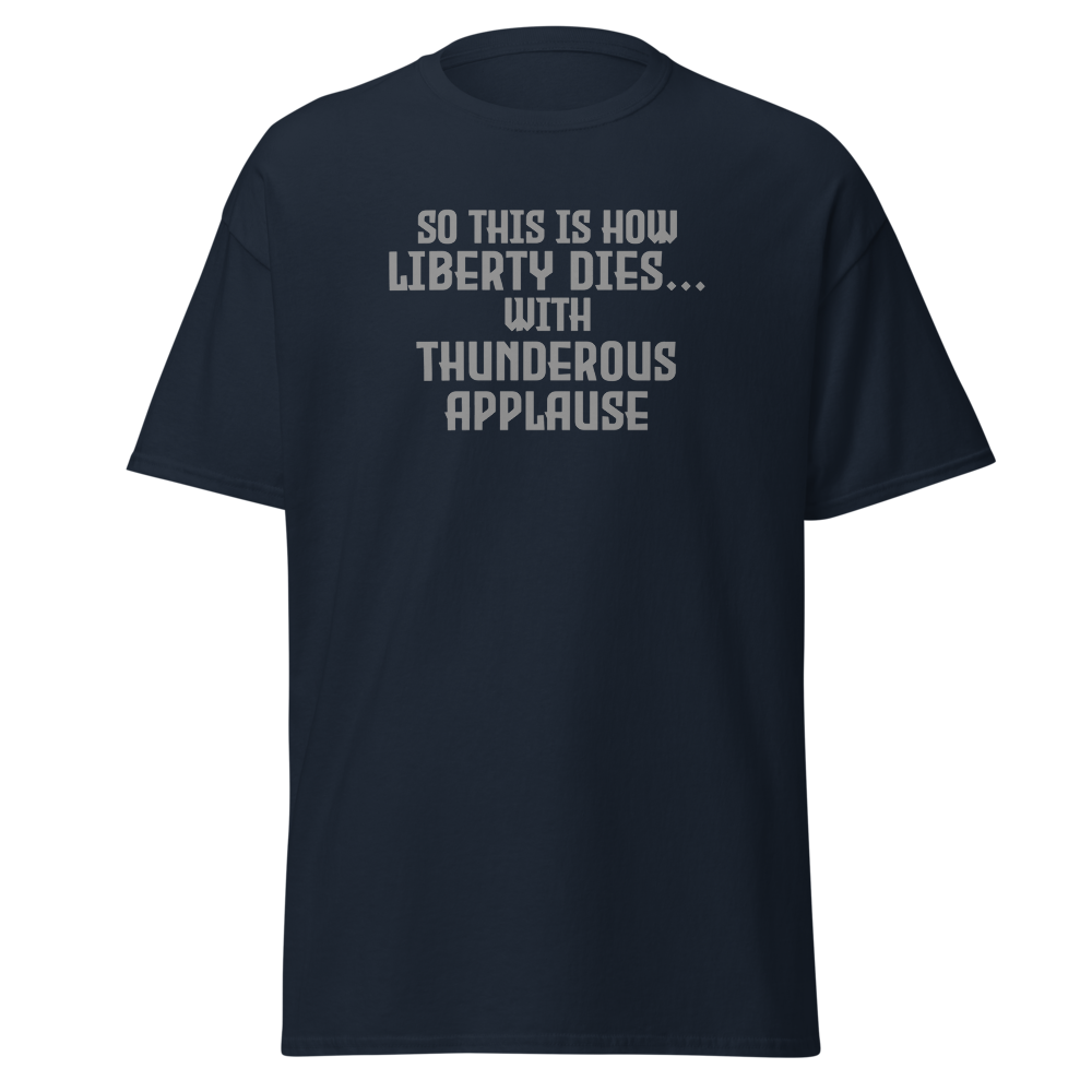 "So this is how liberty dies… with thunderous applause" printed on a navy on an invisible body