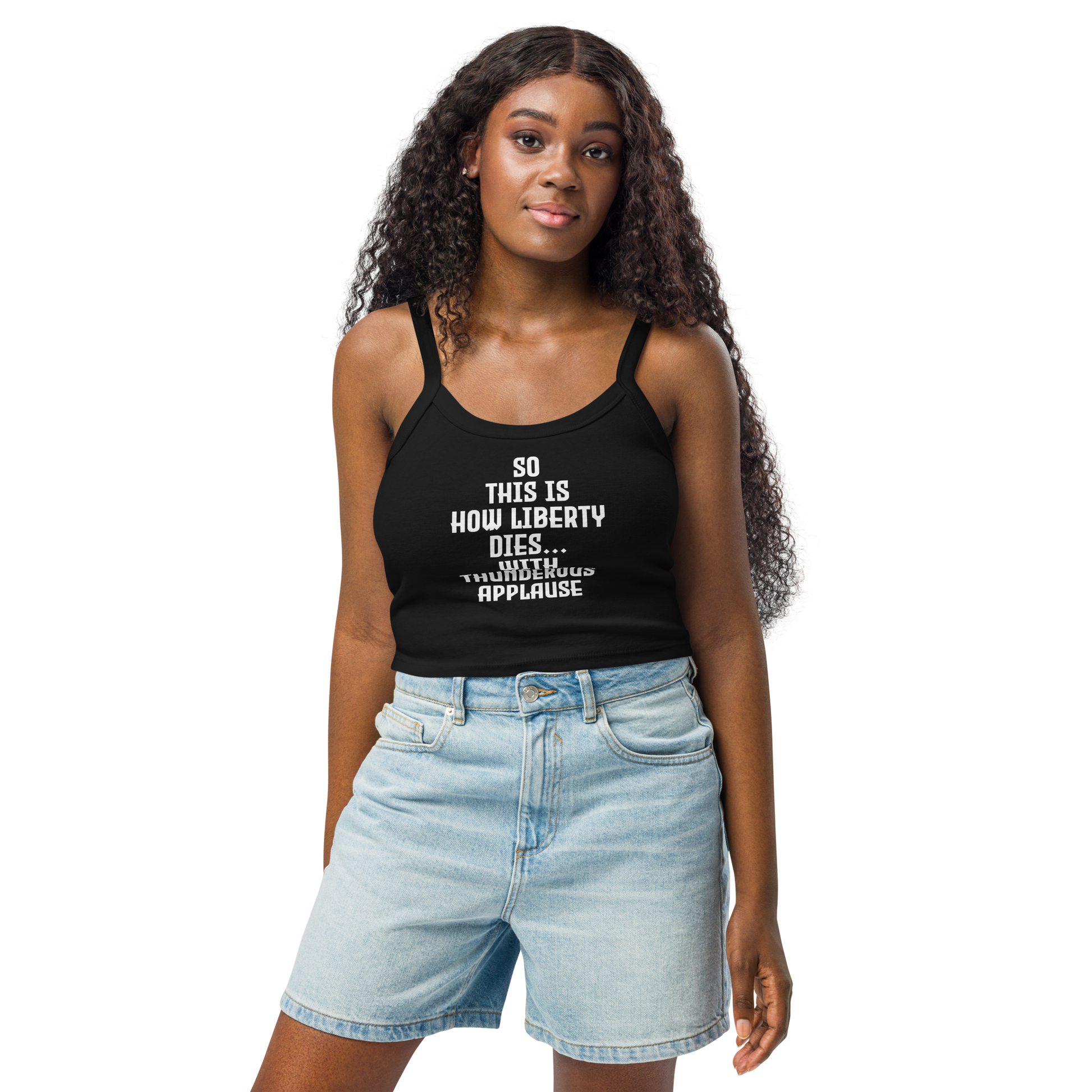 "So this is how liberty dies… with thunderous applause" printed on a solid black blend women's micro-rib tanktop worn by a female