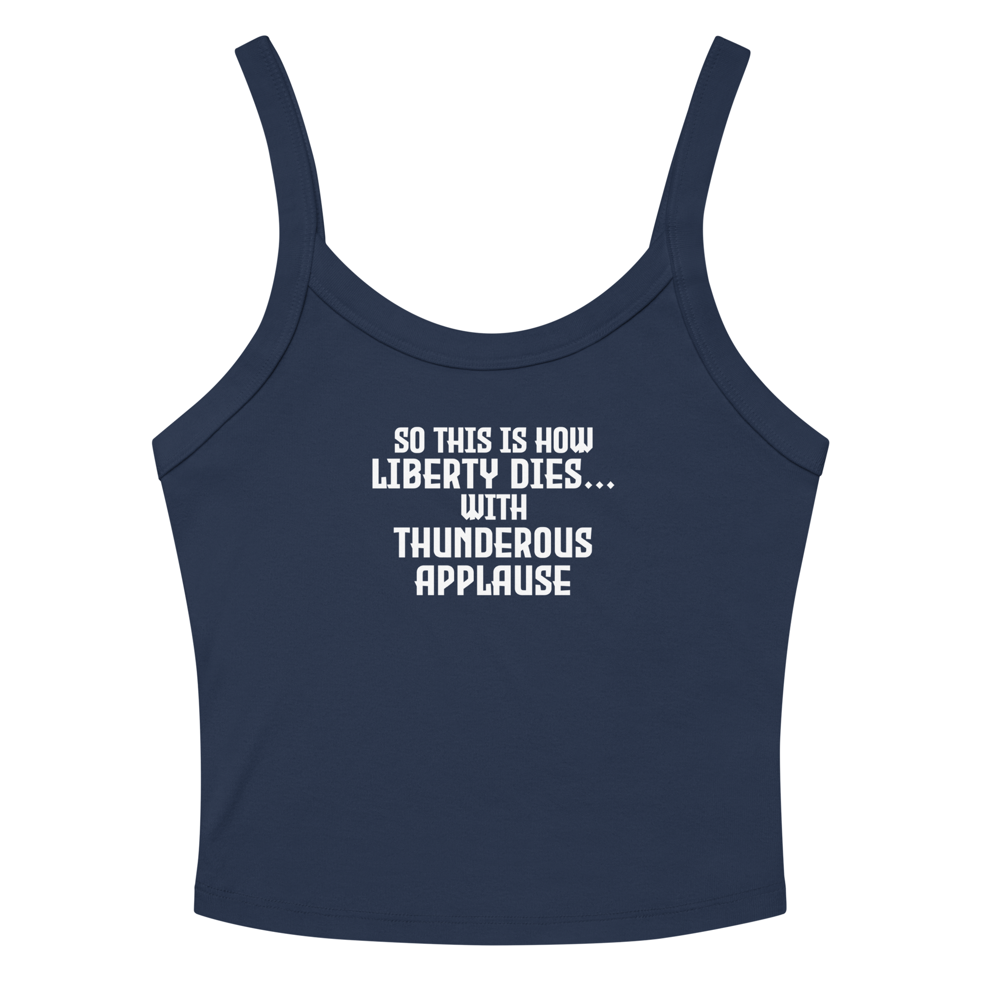 "So this is how liberty dies… with thunderous applause" printed on a solid navy blend women's micro-rib tanktop laying on a flat surface amongst sunglasses and shorts