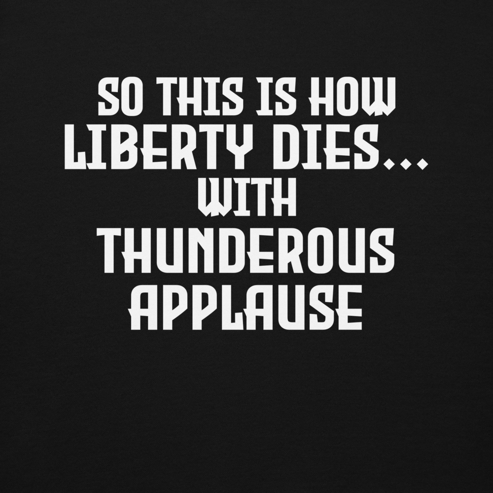 "So this is how liberty dies… with thunderous applause" printed on a black background