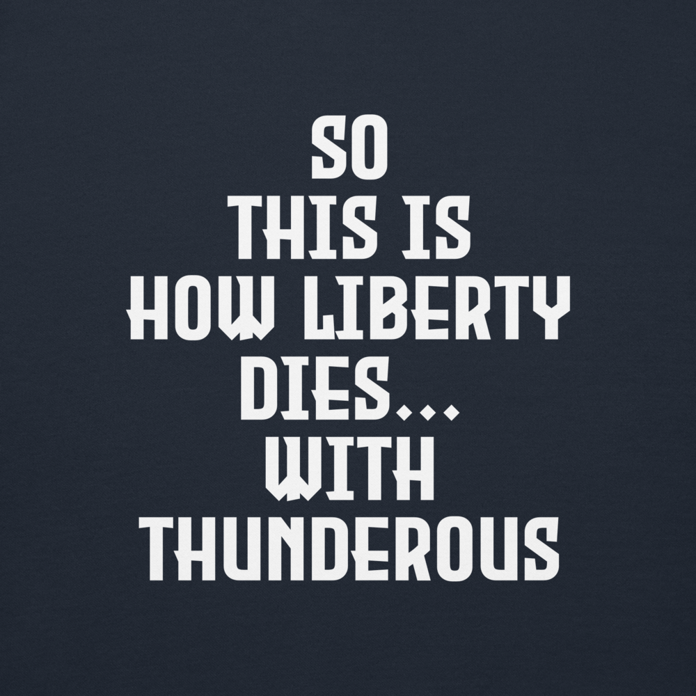 "So this is how liberty dies… with thunderous applause" printed on a navy blazer background