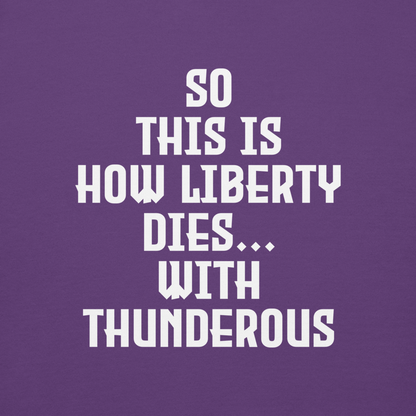 "So this is how liberty dies… with thunderous applause" printed on a purple background
