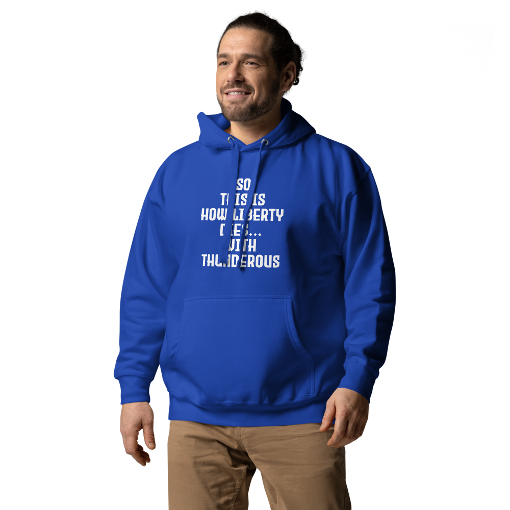 "So this is how liberty dies… with thunderous applause" printed on a team royal unisex hoodie worn by a male