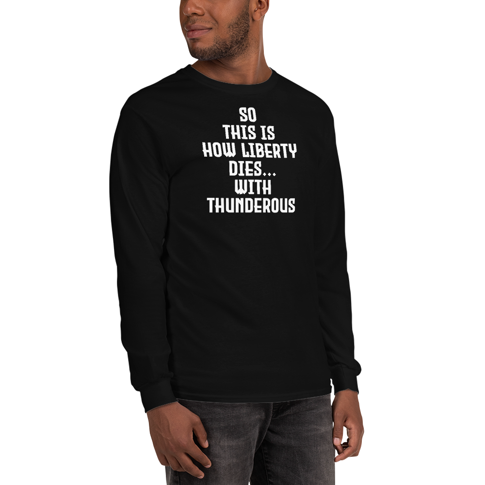 "So this is how liberty dies… with thunderous applause" printed on a black men's long sleeve shirt worn by a male