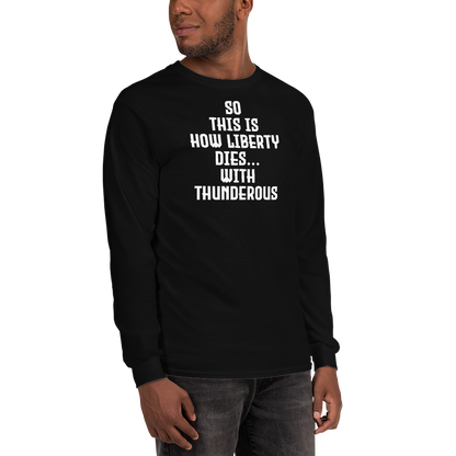 "So this is how liberty dies… with thunderous applause" printed on a black men's long sleeve shirt worn by a male