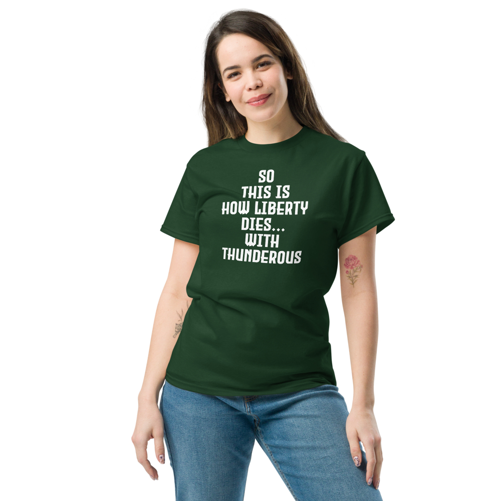 "So this is how liberty dies… with thunderous applause" printed on a forest green unisex classic tee worn by a female