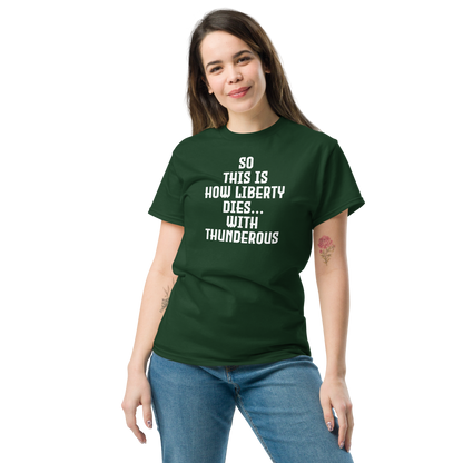 "So this is how liberty dies… with thunderous applause" printed on a forest green unisex classic tee worn by a female