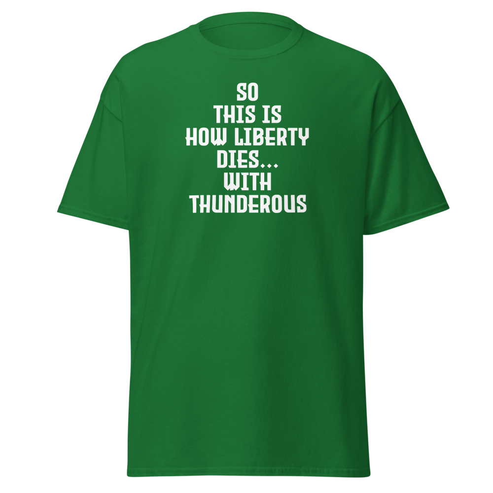 "So this is how liberty dies… with thunderous applause" printed on a turf green on an invisible body