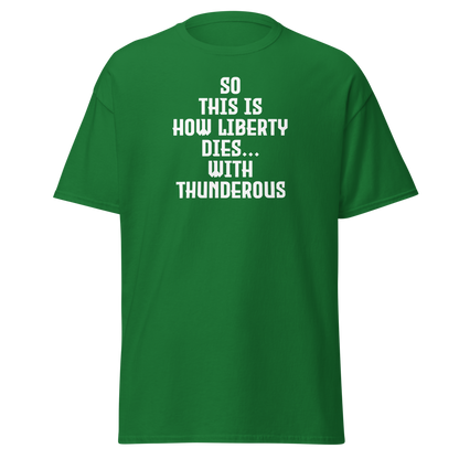 "So this is how liberty dies… with thunderous applause" printed on a turf green on an invisible body