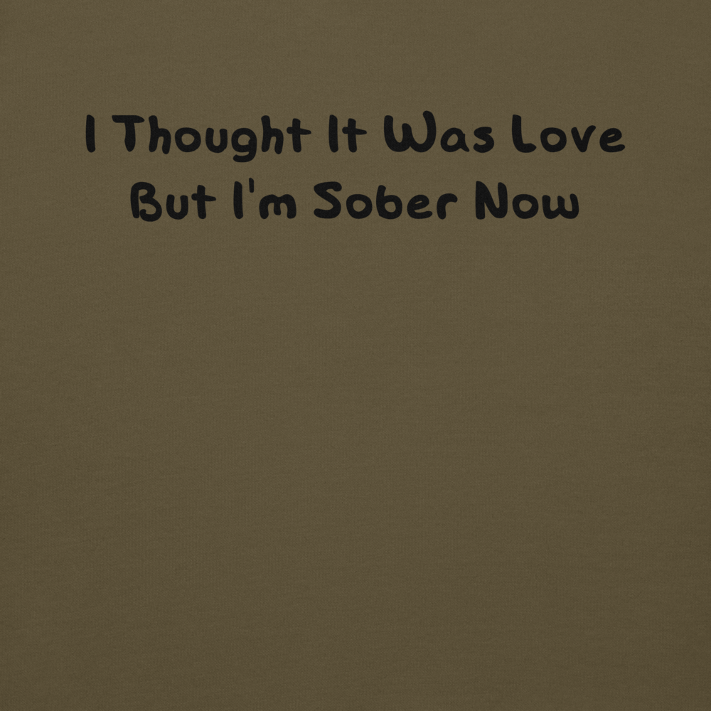 "I thought it was love but I’m sober now" printed on a military green background