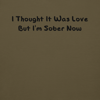 "I thought it was love but I’m sober now" printed on a military green background