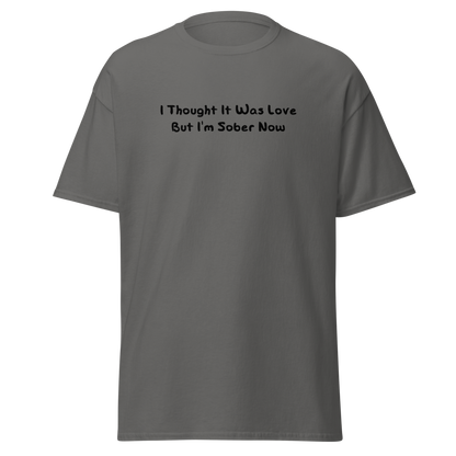 "I thought it was love but I’m sober now" printed on a charcoal on an invisible body