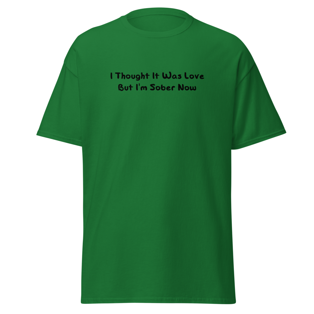"I thought it was love but I’m sober now" printed on a turf green on an invisible body