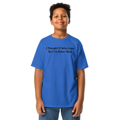 "I thought it was love but I’m sober now" printed on a royal youth classic tee worn by a male