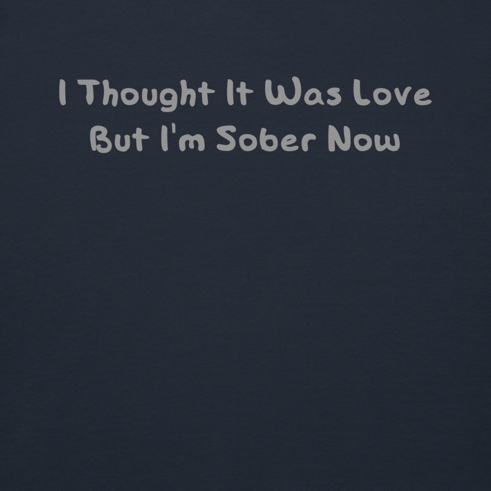 "I thought it was love but I’m sober now" printed on a navy blazer background