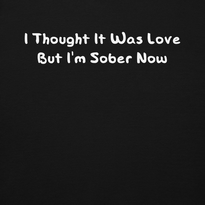 "I thought it was love but I’m sober now" printed on a black background