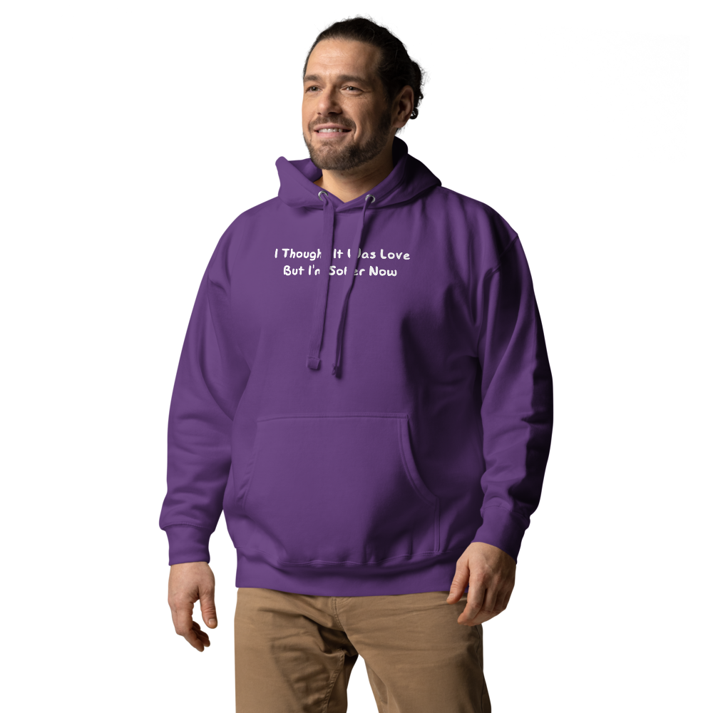 "I thought it was love but I’m sober now" printed on a purple unisex hoodie worn by a male