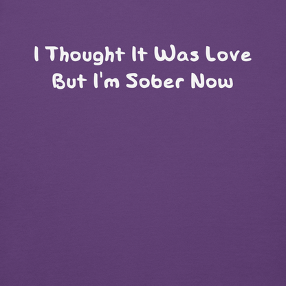 "I thought it was love but I’m sober now" printed on a purple background