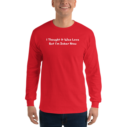 "I thought it was love but I’m sober now" printed on a red men's long sleeve shirt worn by a male
