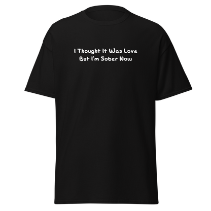 "I thought it was love but I’m sober now" printed on a black on an invisible body