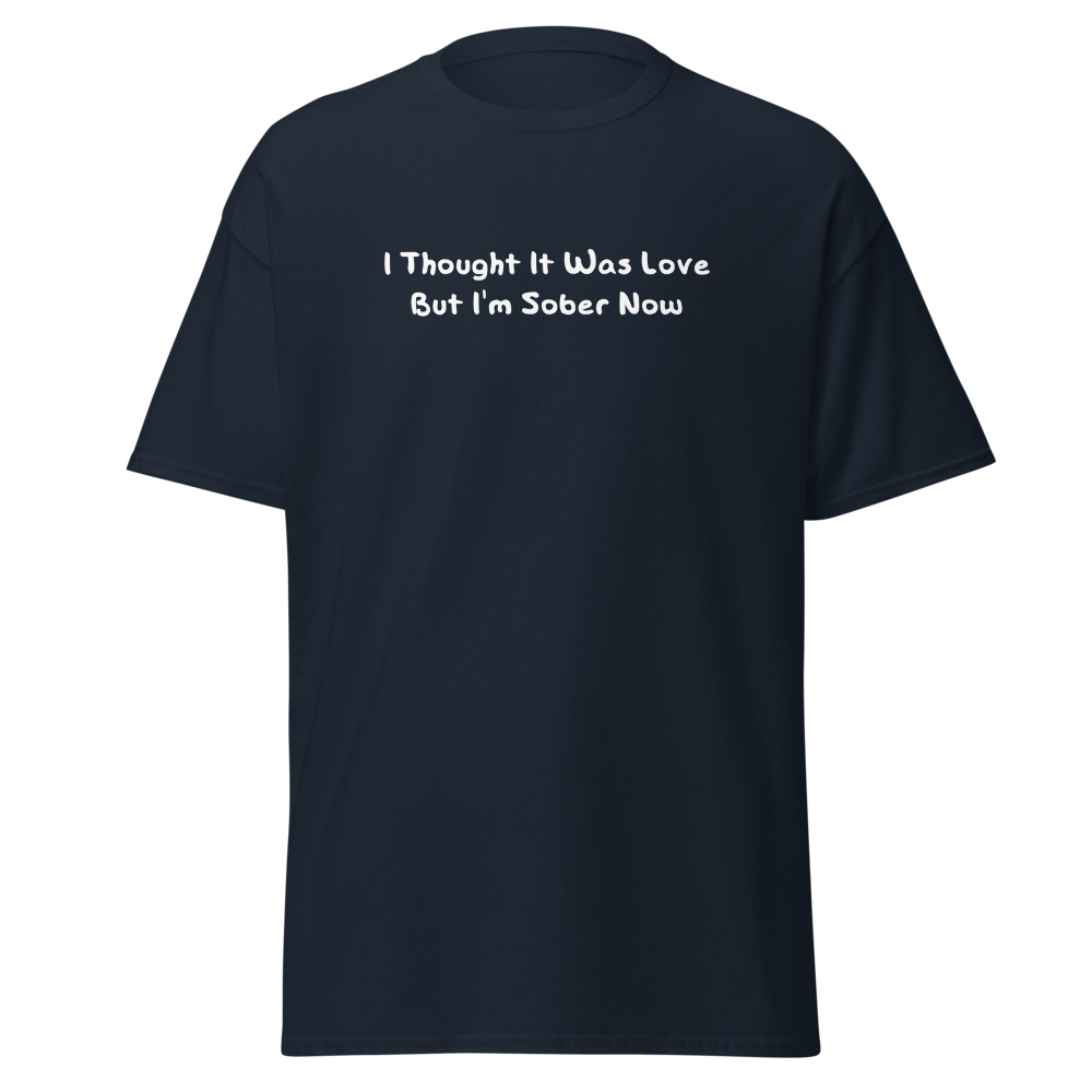 "I thought it was love but I’m sober now" printed on a navy on an invisible body