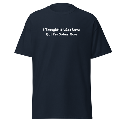 "I thought it was love but I’m sober now" printed on a navy on an invisible body