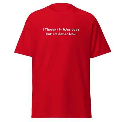 "I thought it was love but I’m sober now" printed on a red on an invisible body