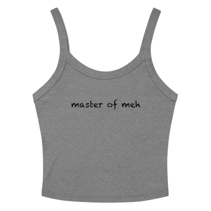 "Master of meh" printed on a athletic heather women's micro-rib tanktop laying on a flat surface amongst sunglasses and shorts