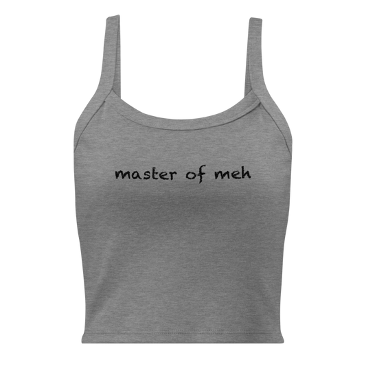 "Master of meh" printed on a athletic heather women's micro-rib tanktop laying on a flat surface
