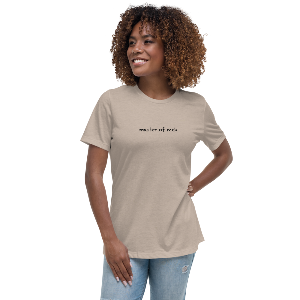 "Master of meh" printed on a heather stone women's relaxed t-shirt worn by a female