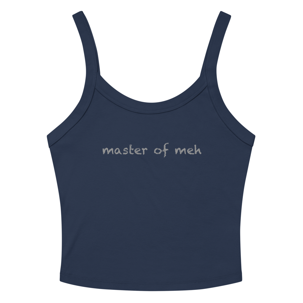 "Master of meh" printed on a solid navy blend women's micro-rib tanktop laying on a flat surface amongst sunglasses and shorts